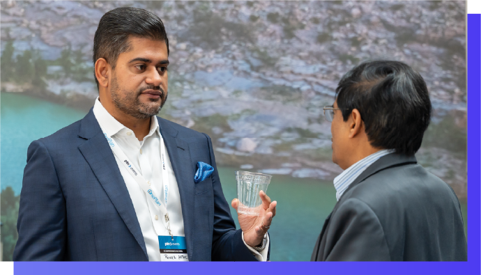 Professional networking at AI in Oil and Gas Conference, artificial intelligence in oil and gas industry event, Delegate enjoying coffee during AI in Oil and Gas networking session
