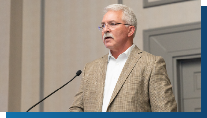 Delegates networking at AI in Oil and Gas conference, Panelists discussing machine learning applications during AI in Oil and Gas conference, Professional conversation during energy technology summit