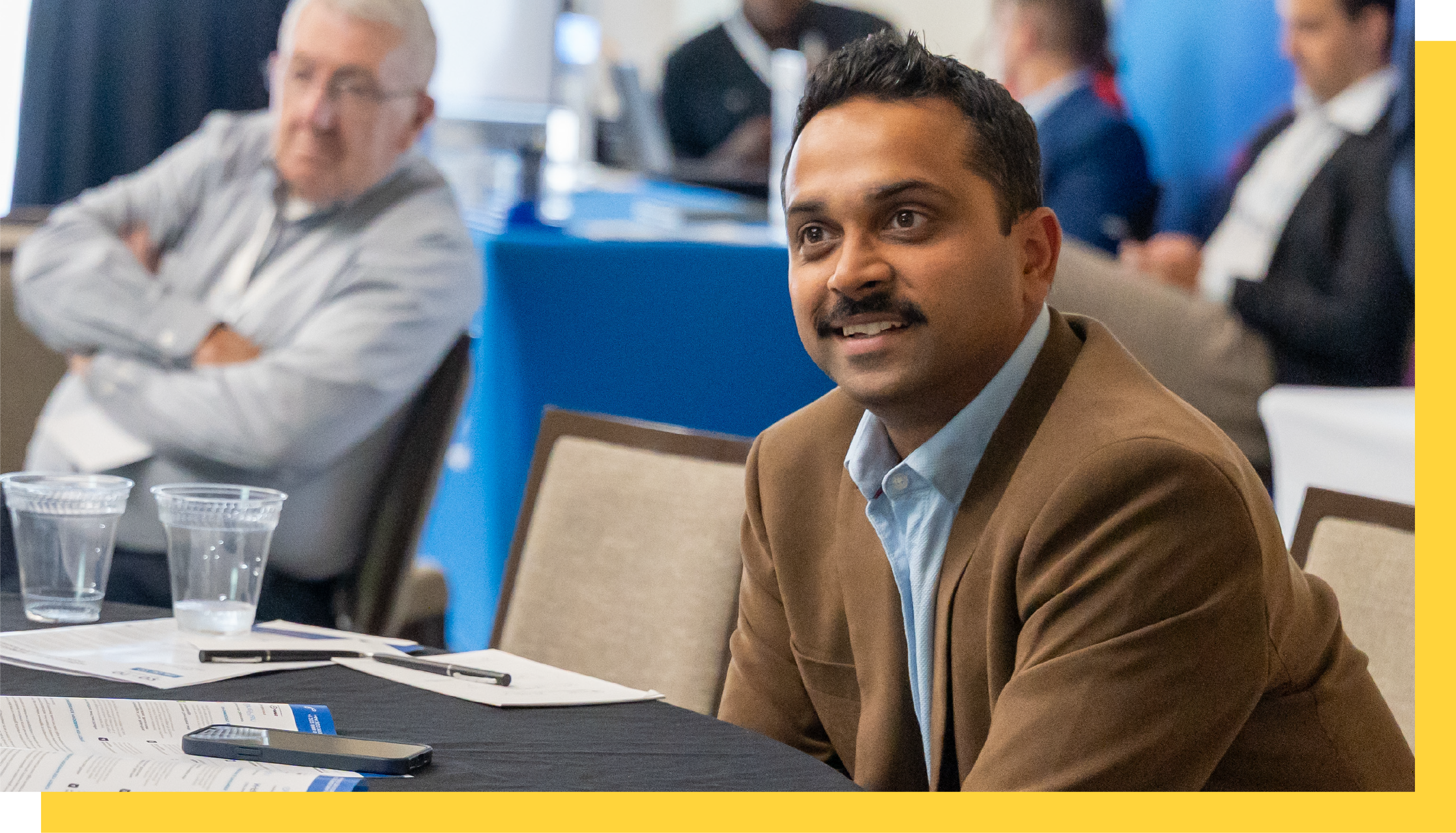 Audience engagement during AI technology forum, Participant contributing to oil and gas innovation panel, Live Q&A session at industrial digitalization conference