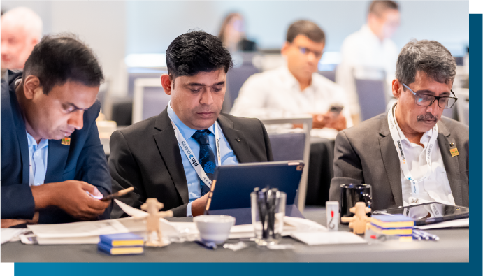 Delegates networking at AI in Oil and Gas conference, Panelists discussing machine learning applications during AI in Oil and Gas conference, Professional conversation during energy technology summit