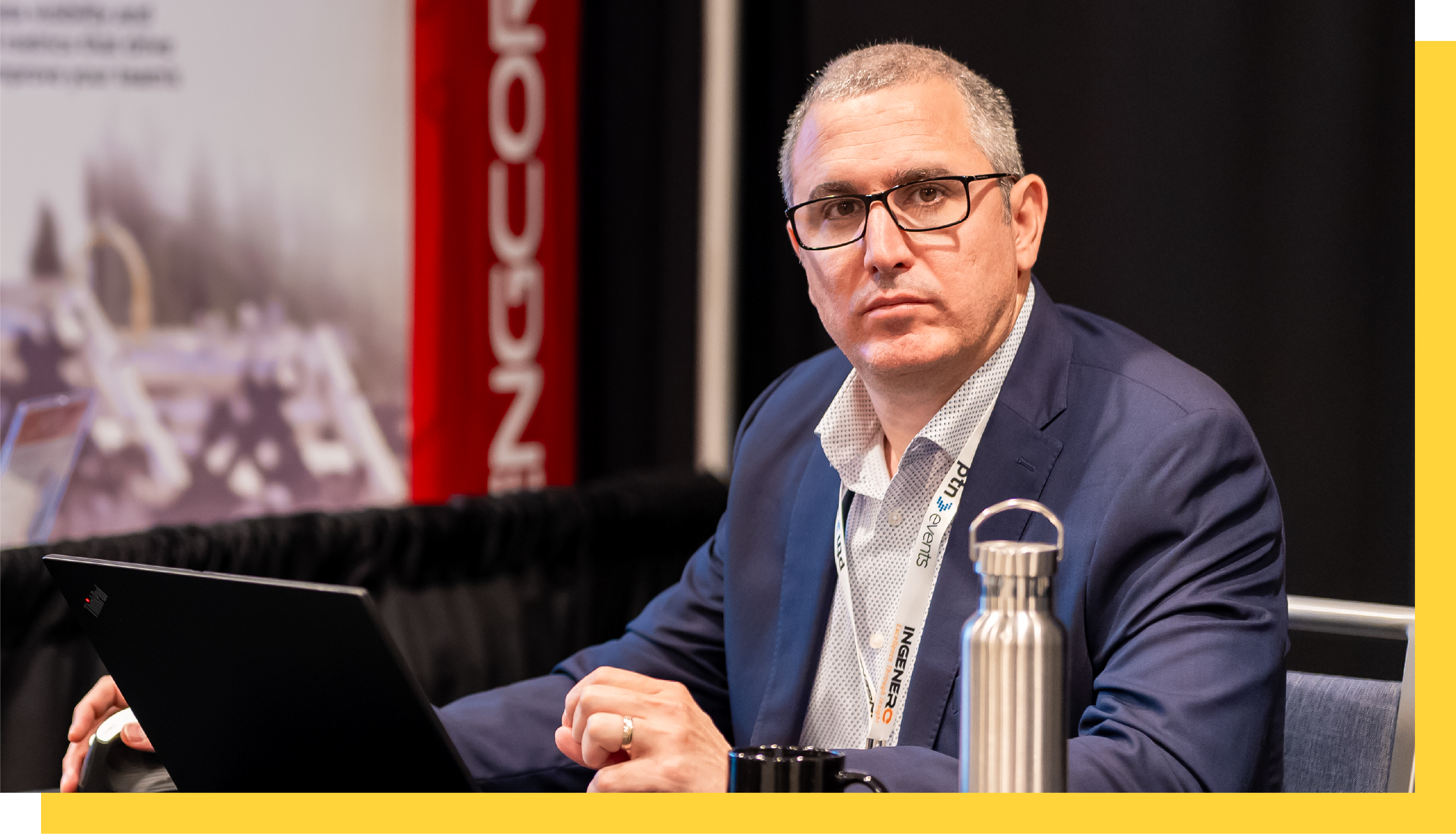 Professional networking at AI in Oil and Gas Conference, artificial intelligence in oil and gas industry event, Delegate enjoying coffee during AI in Oil and Gas networking session